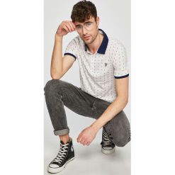 Guess Jeans - Polo. Niebieskie koszulki polo Guess Jeans, m, z aplikacjami, z bawełny, bez kołnierzyka, bez ramiączek. W wyprzedaży za 179.90 zł.