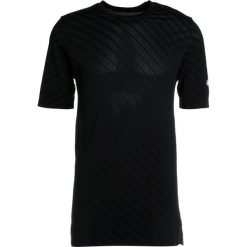 ASICS SEAMLESS Tshirt z nadrukiem performance black. T-shirty ASICS. Za 229.00 zł.