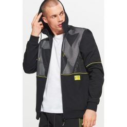 Bluza z kapturem z kolekcji FUUTURISTIC YOUTH - Czarny. Bluzy z kapturem marki DOMYOS. Za 139.99 zł.