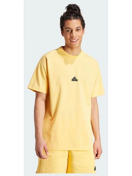 Adidas Koszulka w kolorze żółtym rozmiar: XXL. Żółte bezrękawniki Adidas, xxl, bez wzorów, bez kołnierzyka, bez ramiączek. Za 102.89 zł.