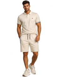 Geographical Norway Koszulka polo "Koliar" w kolorze beżowym rozmiar: XXL. Brązowe koszulki polo Geographical Norway, xxl, bez wzorów, z bawełny, bez kołnierzyka, bez ramiączek. Za 86.99 zł.