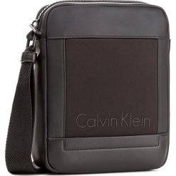 Saszetka CALVIN KLEIN - Caillou Repotrer K50K502885 001. Saszetki i nerki marki CALVIN KLEIN. W wyprzedaży za 239.00 zł.