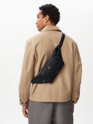 Tommy Hilfiger Nerka Th Central Bumbag AM0AM14437 Czarny. Czarne saszetki i nerki Tommy Hilfiger, bez wzorów, ze skóry. Za 369.99 zł.