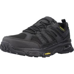 Buty do chodzenia męskie Skechers Skech Air Envoy. Czarne buty sportowe casual Skechers, bez wzorów, z gumy, bez zapięcia. Za 428.06 zł.
