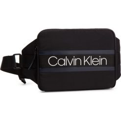 Saszetka nerka CALVIN KLEIN - Clash Ipad Sling K50K504196 001. Saszetki i nerki marki CALVIN KLEIN. Za 279.00 zł.