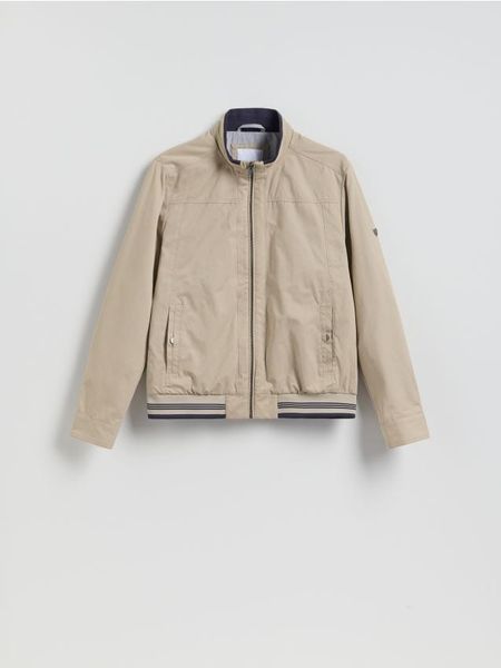 Kurtka bomberka ze stójką - beżowy. Brązowe kurtki Reserved, l, bez wzorów, z bawełny, bez kaptura. Za 159.99 zł.