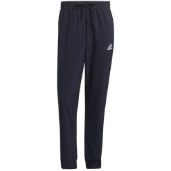 Spodnie męskie adidas Essentials Tapered Cuff 3 Stripes. Czarne spodnie materiałowe Adidas, l, bez wzorów, z polaru, klasyczne. Za 182.00 zł.
