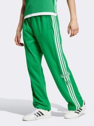 Adidas Spodnie dresowe w kolorze zielonym rozmiar: L. Zielone spodnie treningowe długie Adidas, l, bez wzorów, z dresówki. Za 212.30 zł.