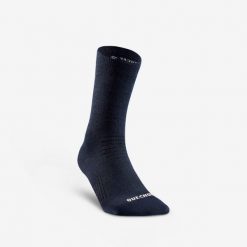 Skarpety turystyczne Quechua SH100 Mid. Niebieskie skarpety QUECHUA, bez wzorów, z elastanu. Za 39.99 zł.