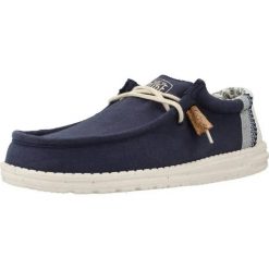 Buty HEY DUDE WALLY LINEN NATURAL Niebieski. Niebieskie buty turystyczne Hey dude, bez wzorów, z tkaniny, bez zapięcia, trekkingowe. Za 350.25 zł.