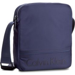 Saszetka CALVIN KLEIN BLACK LABEL - Matthew Reporter K50K502899 422. Saszetki i nerki marki Calvin Klein Black Label. W wyprzedaży za 219.00 zł.