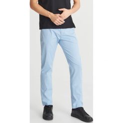 Klasyczne chinosy slim - Niebieski. Sztyblety marki Reserved. Za 129.99 zł.
