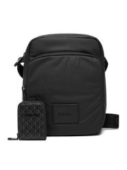 Calvin Klein Saszetka Puffer Utility Reporter LV04D3200G Czarny. Czarne saszetki i nerki CALVIN KLEIN, bez wzorów, z materiału. Za 369.99 zł.