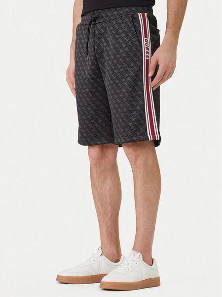 Guess Szorty sportowe Z6GD12 K3220 Czarny Regular Fit. Czarne krótkie spodenki sportowe Guess, m, z aplikacjami, z syntetyku. Za 309.99 zł.