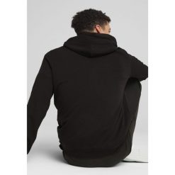 Młodzieżowa bluza z kapturem Essentials z logo No. 1 PUMA Black. Czarna bluzy z kapturem Puma, m, bez wzorów, prążkowane, z kapturem. W wyprzedaży za 214.00 zł.