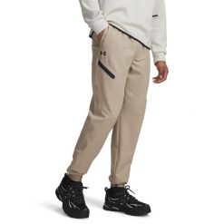 Spodnie treningowe Under Armour Unstoppable Joggers 1388823. Brązowe joggery i bojówki Under Armour, m, bez wzorów, z elastanu. Za 300.35 zł.