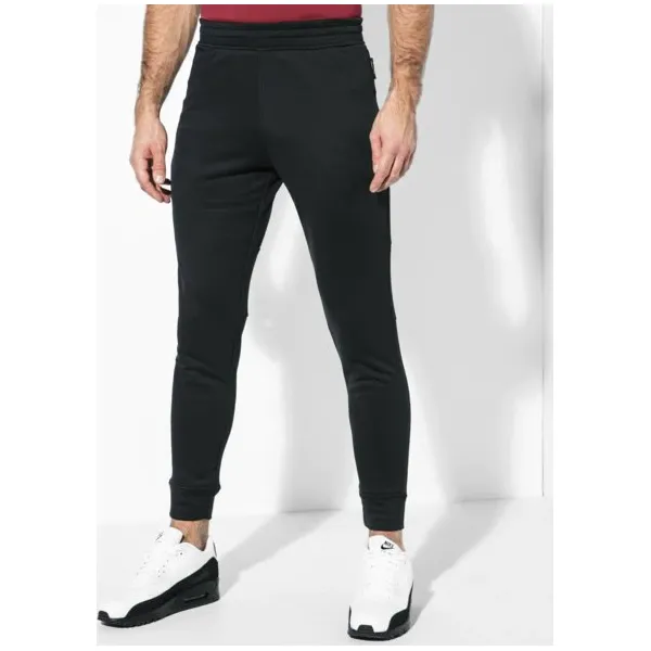 Under Armour Spodnie Mk1 Terry Jogger , czarny, rozmiar M. Czarne joggery i bojówki Under Armour, m, bez wzorów, z materiału. W wyprzedaży za 129.99 zł.