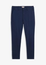 Spodnie chinosy regular fit z ciepłą podszewką flanelową, tapered. Niebieskie eleganckie spodnie bonprix, m. Za 189.99 zł.