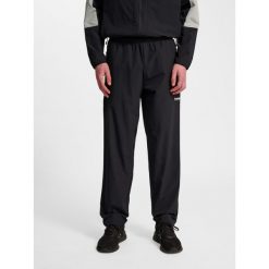 Spodnie do biegania Hummel Pulse. Czarne buty do biegania Hummel, bez wzorów, z dresówki, bez zapięcia, do biegania. Za 267.00 zł.