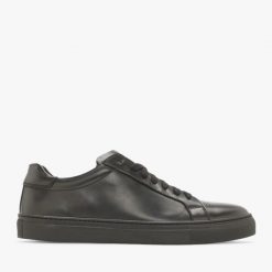 Czarne trampki męskie DILLON. Czarne trampki Ryłko, m, bez wzorów, bez zapięcia. Za 429.99 zł.