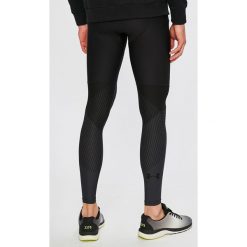 Under Armour - Spodnie. Czarne spodnie treningowe długie Under Armour, m, bez wzorów, z dzianiny. W wyprzedaży za 99.90 zł.