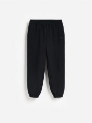 Spodnie jogger z polarem - czarny. Czarne joggery i bojówki Reserved, l, bez wzorów, z polaru. Za 149.99 zł.