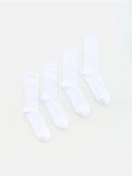 4 pack długich skarpet - biały. Białe skarpety Reserved, bez wzorów. Za 49.99 zł.