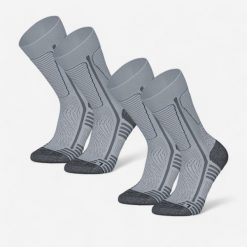 Skarpety turystyczne SH500 Mountain Mid. Niebieskie skarpety QUECHUA, bez wzorów, z elastanu. Za 84.99 zł.