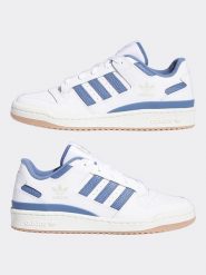 Adidas Sneakersy w kolorze biało-niebieskim rozmiar: 43. Białe buty sportowe casual Adidas, bez wzorów, bez zapięcia. Za 346.99 zł.