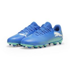Młodzieżowe buty piłkarskie FUTURE 7 PLAY FG/AG PUMA. Biała buty do biegania Puma, bez wzorów, z syntetyku, bez zapięcia, do piłki nożnej. Za 185.00 zł.