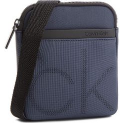 Saszetka CALVIN KLEIN - Ck Point Mini Flat C K50K503875 443. Torby na ramię marki CALVIN KLEIN. W wyprzedaży za 249.00 zł.