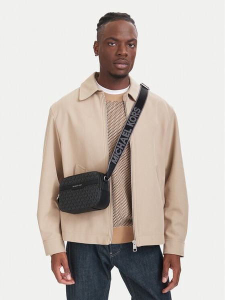 MICHAEL Michael Kors Saszetka 33F5SMLC2B Czarny. Czarne saszetki i nerki MICHAEL Michael Kors, bez wzorów, ze skóry, bez dodatków. Za 899.99 zł.
