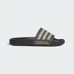 Klapki męskie basenowe Adidas ADILETTE. Szare klapki Adidas, z materiału. Za 129.99 zł.