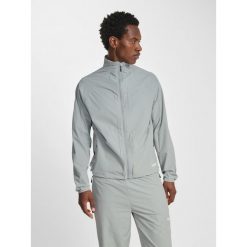 Kurtka z dresu Hummel Pulse. Szare kurtki Hummel, bez wzorów, z dresówki, bez kaptura. Za 286.50 zł.
