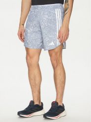 Adidas Szorty sportowe Own the Run 3-Stripes JD7769 Niebieski Regular Fit. Niebieskie krótkie spodenki sportowe Adidas, m, bez wzorów, z syntetyku. Za 199.99 zł.