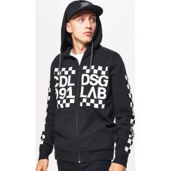 Zapinana bluza z kapturem - Czarny. Bluzy z kapturem marki DOMYOS. W wyprzedaży za 59.99 zł.