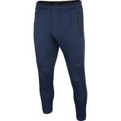 Spodnie treningowe męskie SPMTR202 - ciemny granat. Spodnie treningowe długie marki 4F. Za 159.99 zł.