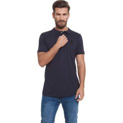 Koszulka polo w kolorze granatowym. Koszulki polo Lonsdale, Kangol. W wyprzedaży za 59.95 zł.