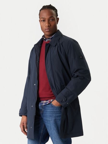 Tommy Hilfiger Płaszcz przejściowy MW0MW42569 Granatowy Regular Fit. Niebieskie płaszcze Tommy Hilfiger, m, bez wzorów, z syntetyku, bez kaptura. Za 1,299.00 zł.