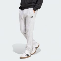 Spodnie polarowe Essentials Feelcozy. Czarne eleganckie spodnie Adidas, z polaru, eleganckie. Za 219.00 zł.