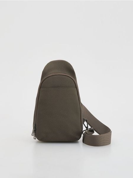 Saszetka crossbody - brązowy. Brązowe torby na ramię Reserved, bez wzorów, małe, bez dodatków. Za 99.99 zł.