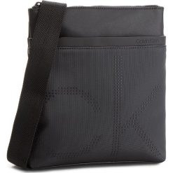 Saszetka CALVIN KLEIN - Ck Poit Flat Crosso K50K503877 001. Torby na ramię marki CALVIN KLEIN. W wyprzedaży za 279.00 zł.