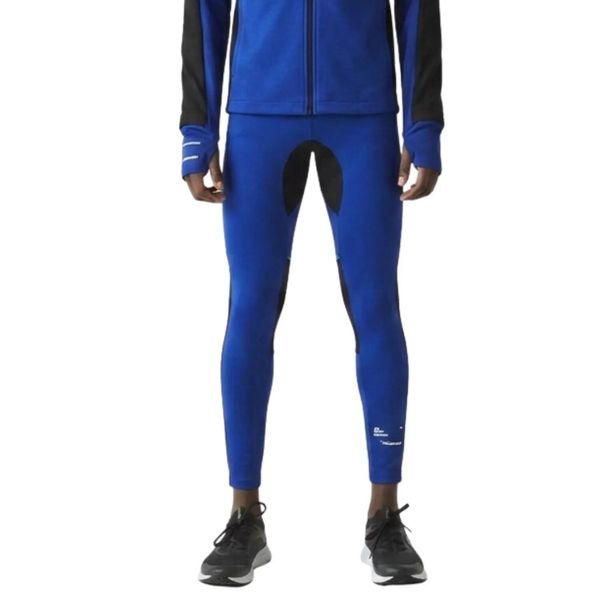 Legginsy męskie Lacoste sportowe treningowe niebieskie. Niebieskie legginsy długie sportowe LACOSTE, l, bez wzorów, z materiału, do biegania. Za 265.76 zł.