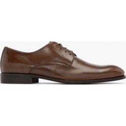 Brązowe półbuty męskie ANDREW. Brązowe eleganckie półbuty Ryłko, bez wzorów, ze skóry, bez obcasa, bez zapięcia. Za 449.99 zł.