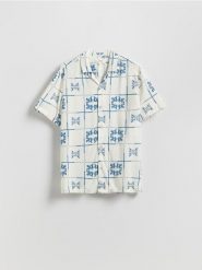 Koszula regular fit z wiskozy - złamana biel. Koszule Reserved, l, bez wzorów, z wiskozy, bez kołnierzyka, bez ramiączek. Za 139.99 zł.