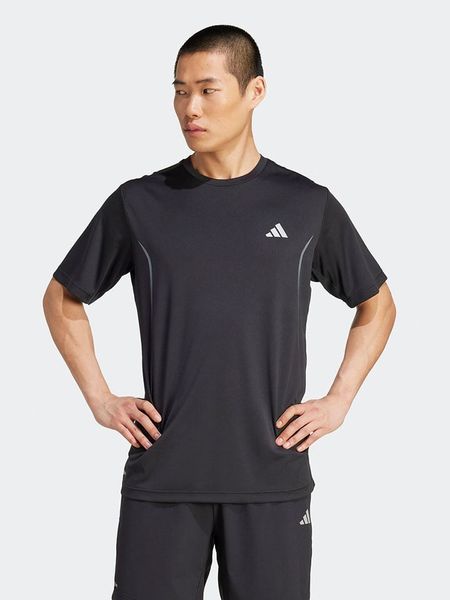 Adidas Koszulka sportowa w kolorze czarnym rozmiar: S. Czarne t-shirty sportowe Adidas, bez wzorów, z materiału, bez ramiączek, outdoorowe. Za 121.35 zł.