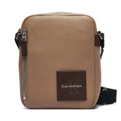 Saszetka Calvin Klein. Brązowe saszetki i nerki CALVIN KLEIN, bez wzorów. Za 369.99 zł.