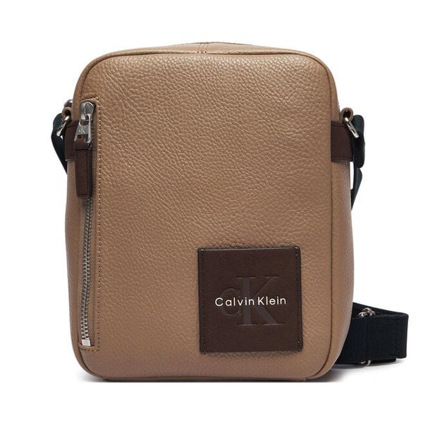 Saszetka Calvin Klein. Brązowe saszetki i nerki CALVIN KLEIN, bez wzorów. Za 369.99 zł.