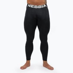 Legginsy NEBBIA Discipline. Czarne legginsy długie sportowe Nebbia, bez wzorów, na fitness i siłownię. Za 239.99 zł.