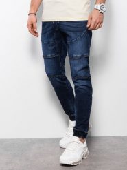 Spodnie męskie marmurkowe JOGGERY z ozdobnymi przeszyciami - granatowe V1. Niebieskie joggery i bojówki Ombre Clothing, l, bez wzorów, z bawełny. W wyprzedaży za 69.99 zł.